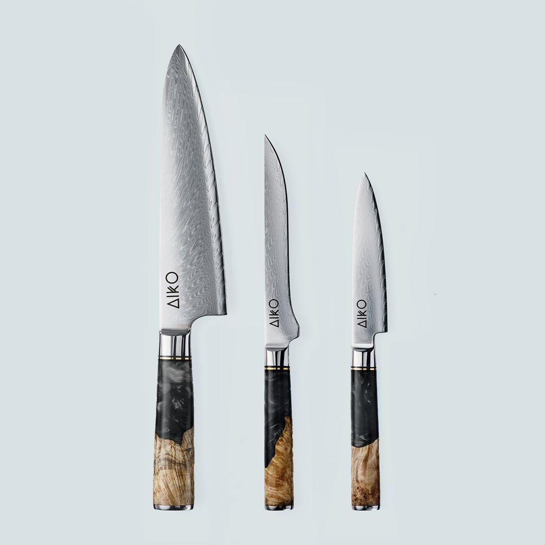 Cuchillo Aiko de acero damasco negro con mango de resina de color negro