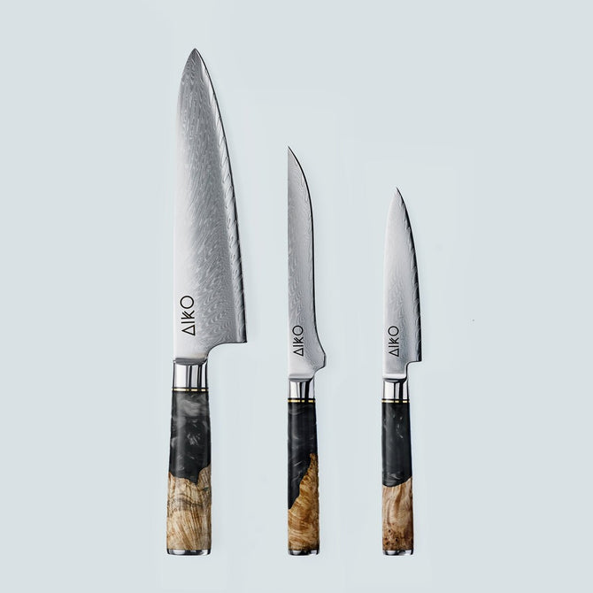 Cuchillo Aiko de acero damasco negro con mango de resina de color negro