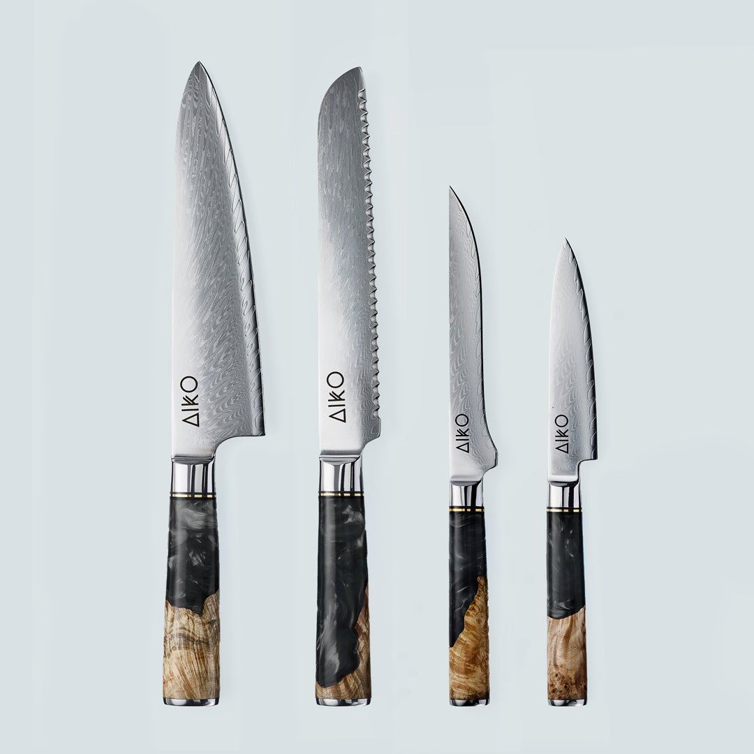 Cuchillo Aiko de acero damasco negro con mango de resina de color negro