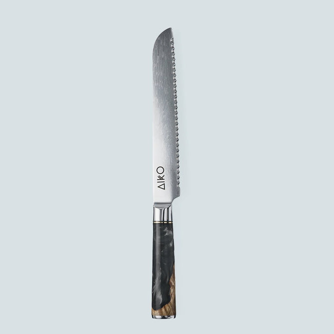 Cuchillo Aiko de acero damasco negro con mango de resina de color negro
