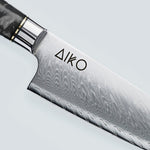 Cuchillo Aiko de acero damasco negro con mango de resina de color negro