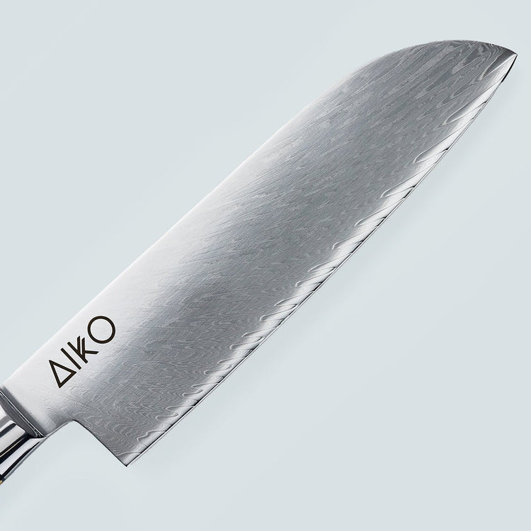 Cuchillo Aiko de acero damasco negro con mango de resina de color negro